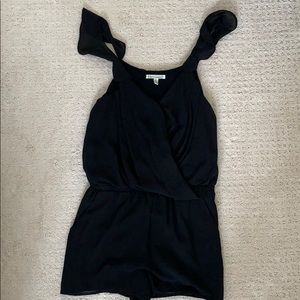 Black romper with loose fitting upper portion